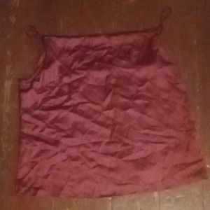 A red spaghetti strap shirt